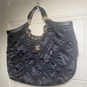 CHANEL maxi Black Quilted Tote with Gold Chain